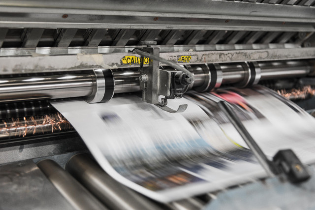 A running printing press